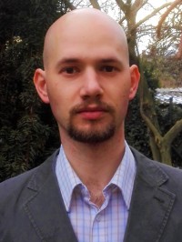 Dr.  Kamarás János profilképe.