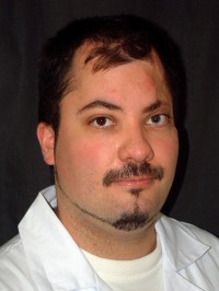 Dr.  Heckenast Dénes profilképe.